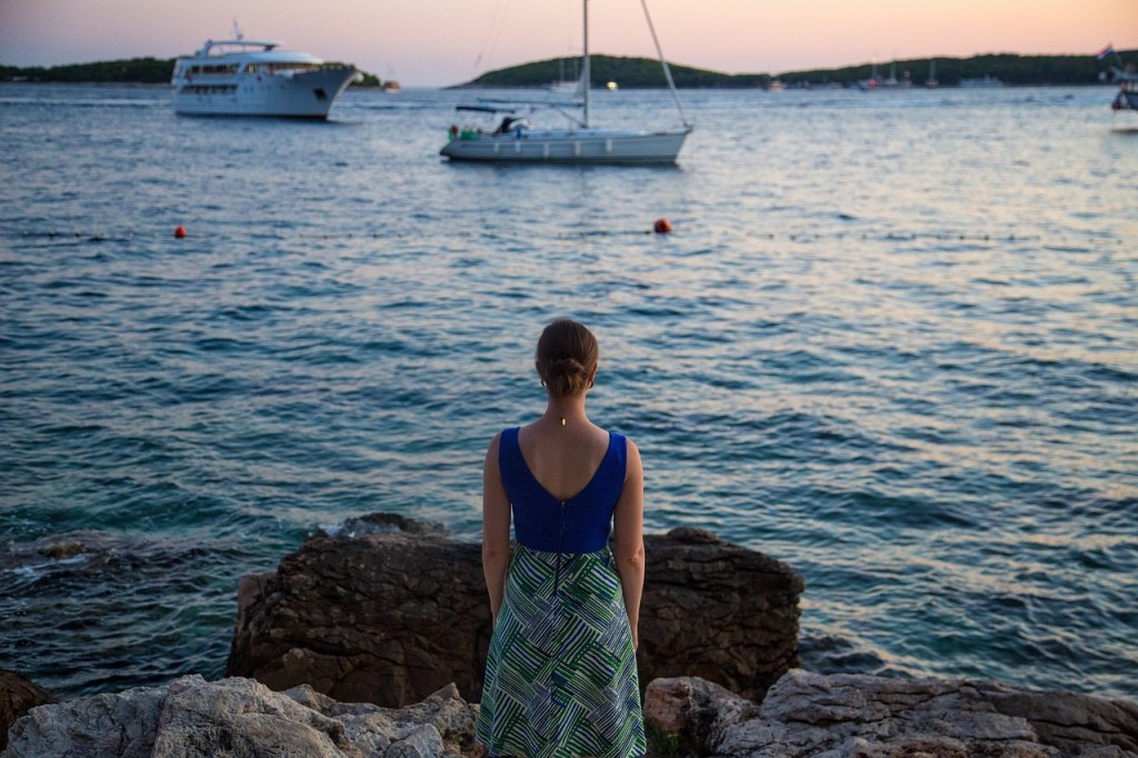 Solo travel, woman travel, female travel, overlooking water